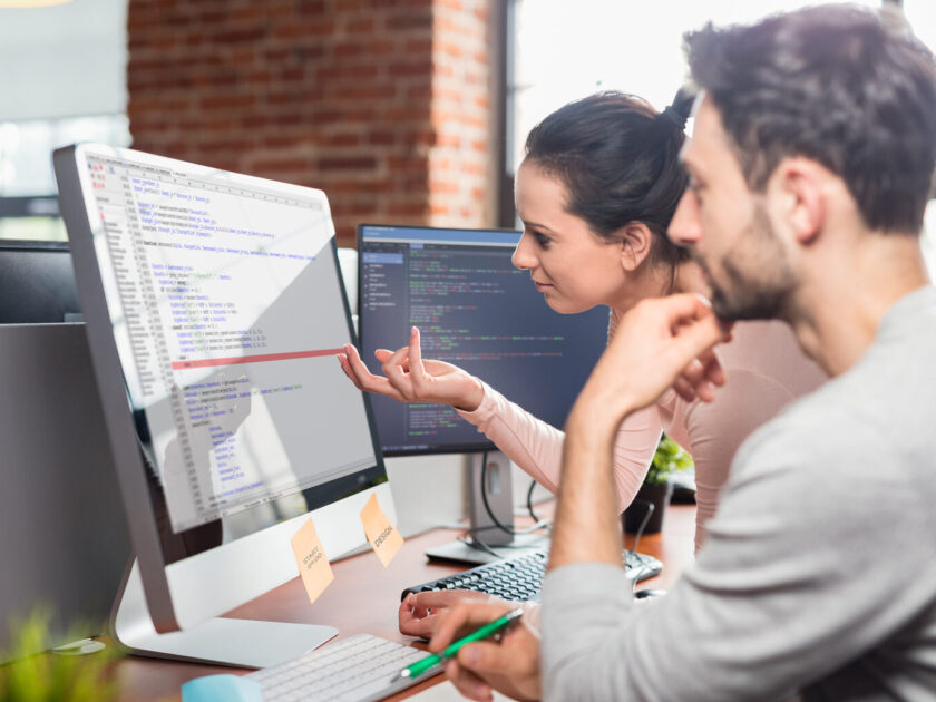 Developing programming and coding technologies. Website design. Programmer working in a software develop company office.